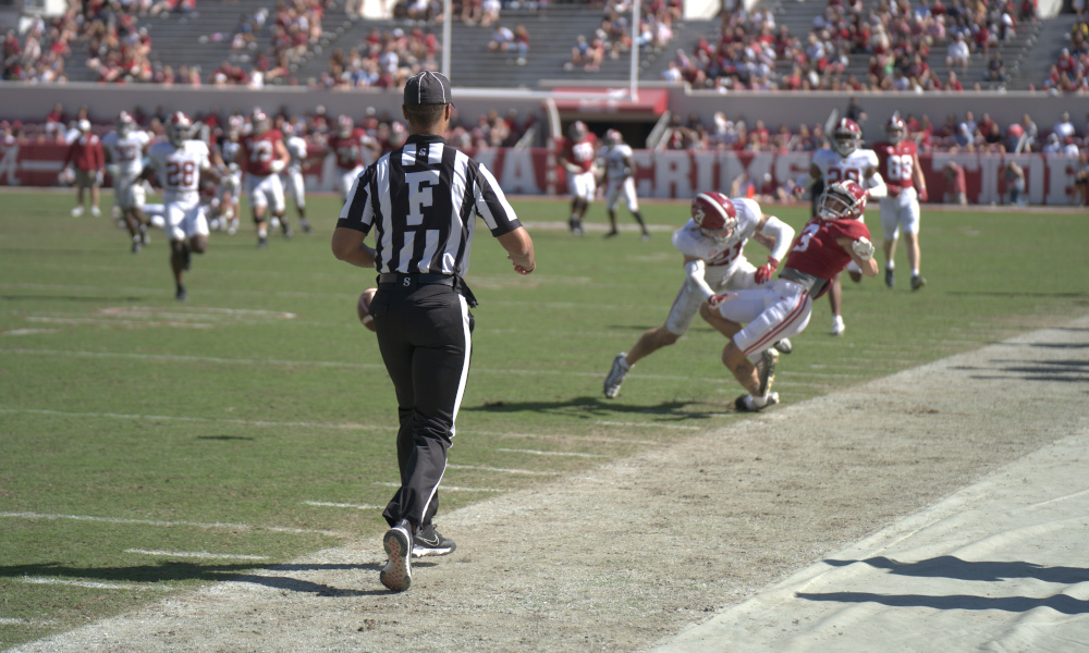 Alabama DB Jake Pope (#21) breaks up a pass intended for Jermaine Burton at A-Day.