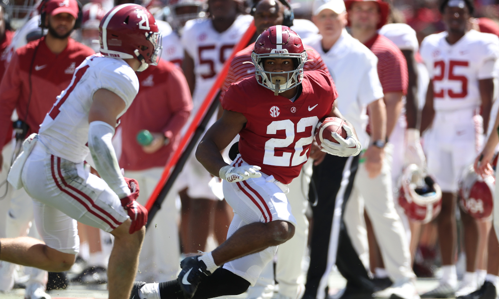 Alabama RB Justice Haynes (#22) running along the sideline during A-Day game.