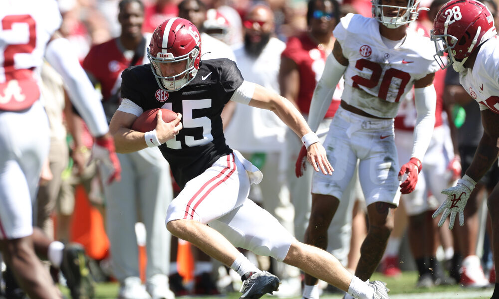 Ty Simpson scrambles downfield for a first down during A-Day