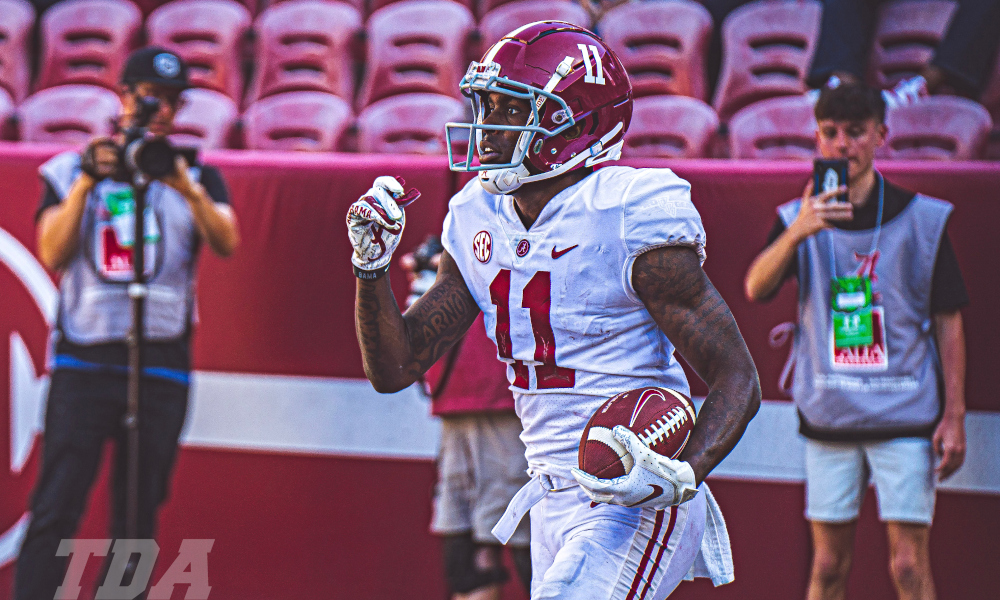 Alabama WR Malik Benson (#11) celebrates a touchdown catch in 2023 spring game.