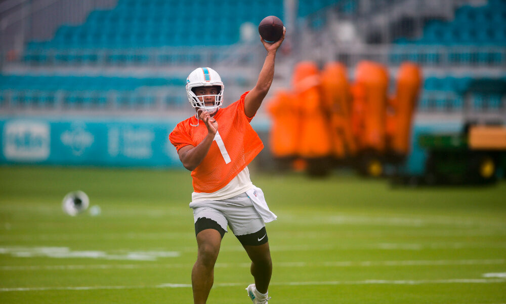 Tua Tagovailoa throws a pass at Dolphins practice