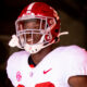 Deontae Lawson runs out of the tunnel against Florida at Ben Hill Griffin Stadium