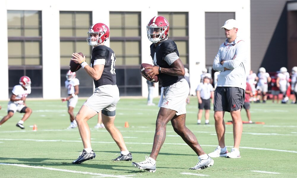 Ty Simpson and Jalen Milroe warmup at Alabama practice