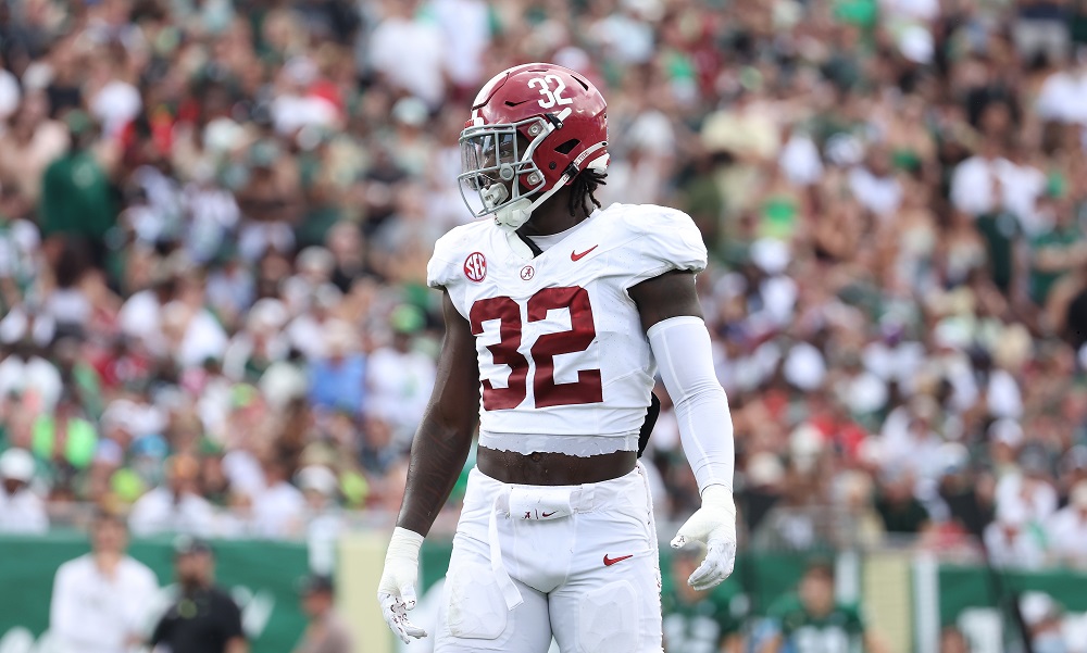 Alabama linebacker Deontae Lawson gets a play call against Florida