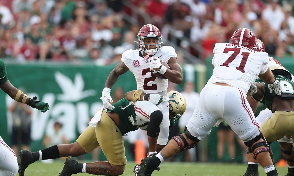 Alabama running back Jase McClellan carries the ball against USF
