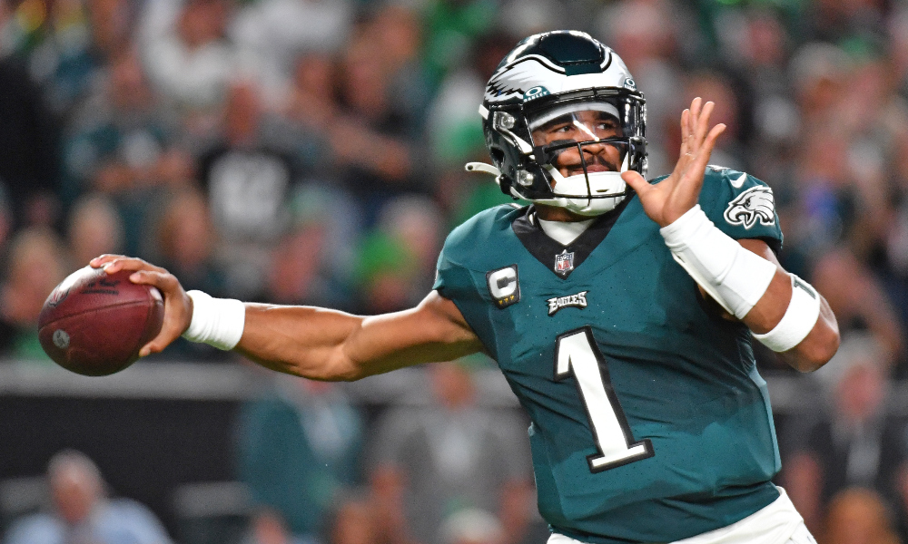 Eagles quarterback Jalen Hurts throws a pass against the Vikings