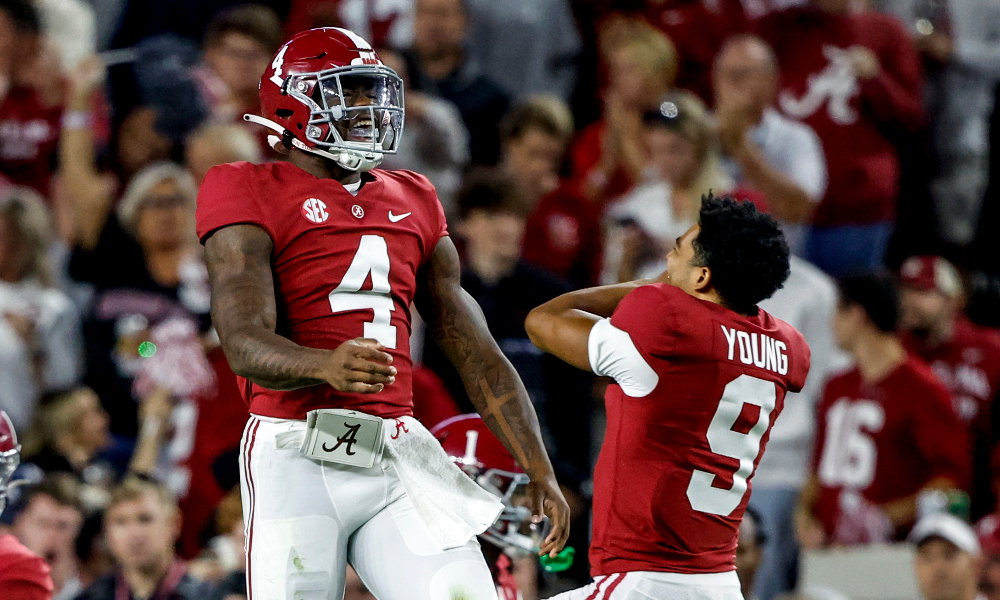 Jalen Milroe and Bryce Young celebrate a touchdown