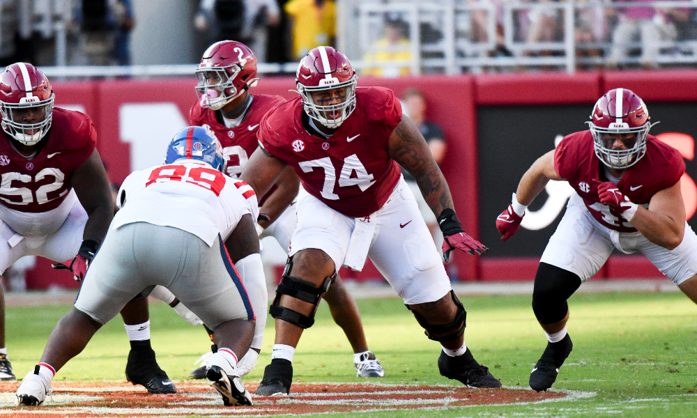 Alabama offensive lineman Kadyn Proctor blocks against Ole Miss