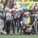 Patriots quarterback Mac Jones thrown to the ground against the Jets