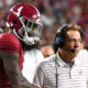 Alabama head coach Nick Saban shakes quarterback Jalen Milroe's hand