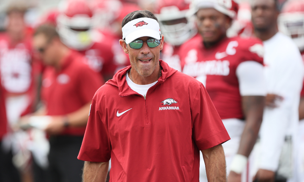 Arkansas offensive coordinator Dan Enos walks the sidelines