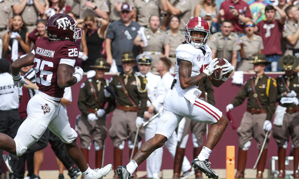 Alabama wide receiver Isaiah Bond catches a touchdown against Texas A&M