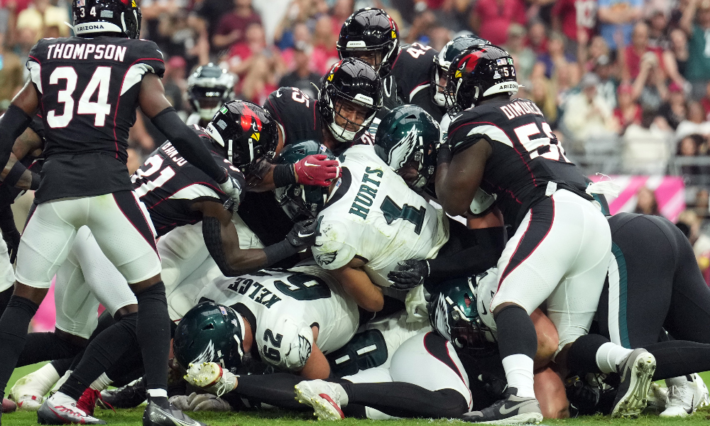The Philadelphia Eagles execute the tush push with quarterback Jalen Hurts
