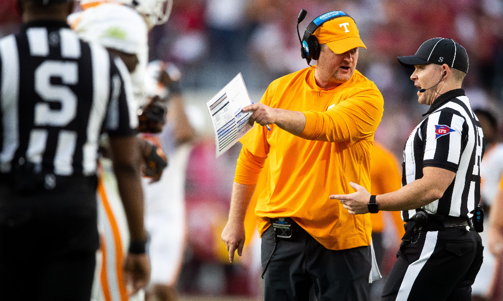 Tennessee head coach Josh Heupel talks with official vs. Alabama