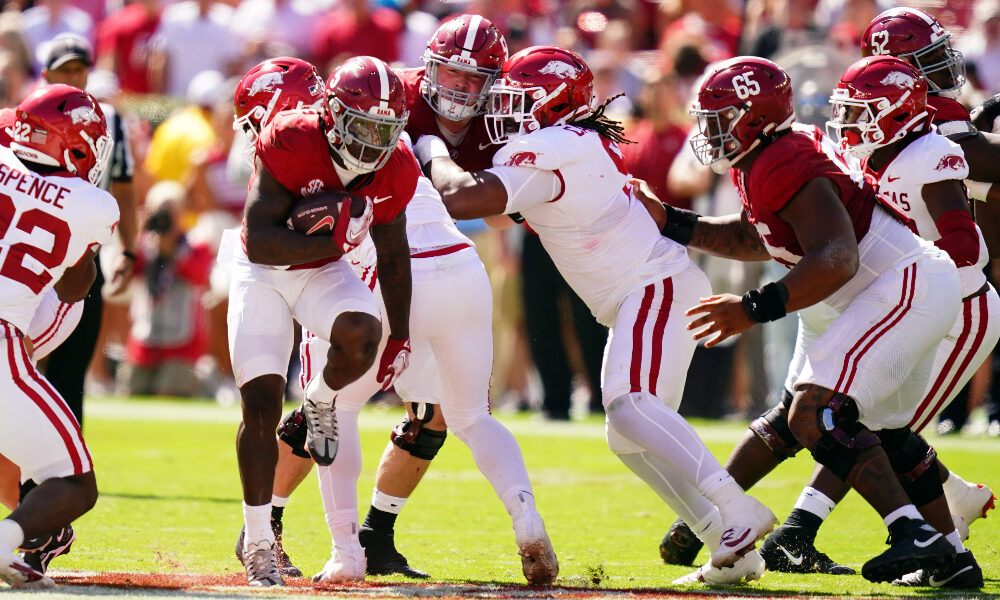Alabama running back Roydell Williams carries the ball between the offensive line