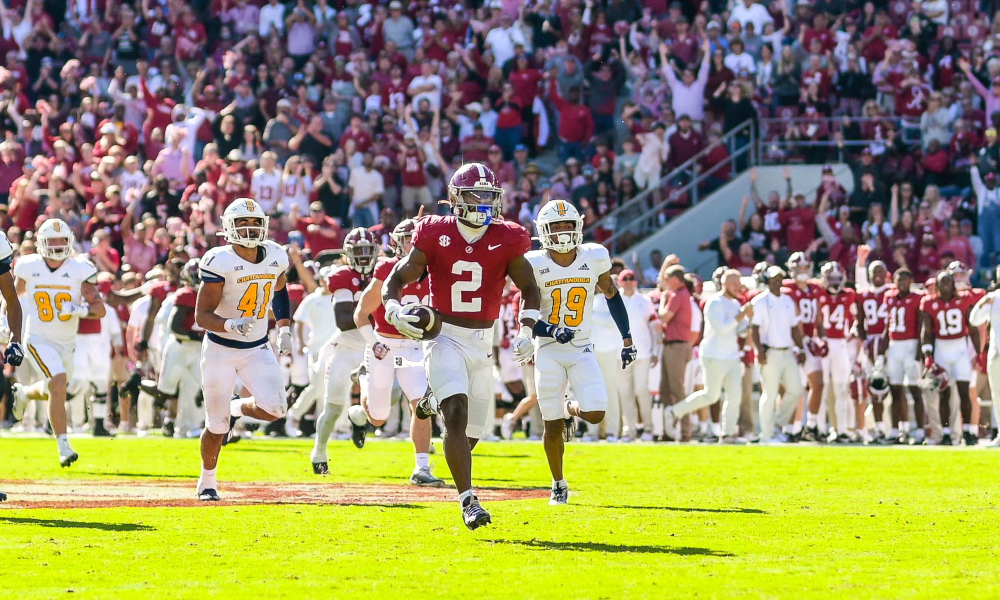 Alabama defensive back Caleb Downs returns a punt for a touchdown against Chattanooga