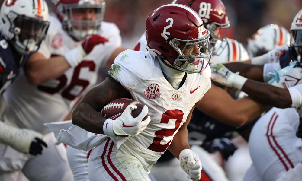 Alabama running back Jase McClellan carries the ball in the Iron Bowl