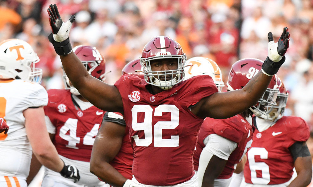Alabama defensive lineman Justin Eboigbe celebrates a play against Tennessee