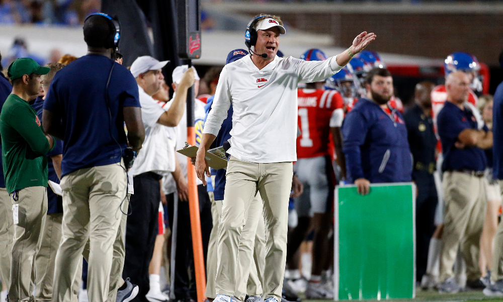 Ole Miss head coach Lane Kiffin argues a call on the field