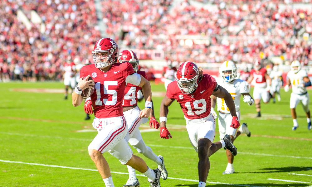 Alabama quarterback Ty Simpson carries the ball against Chattanooga