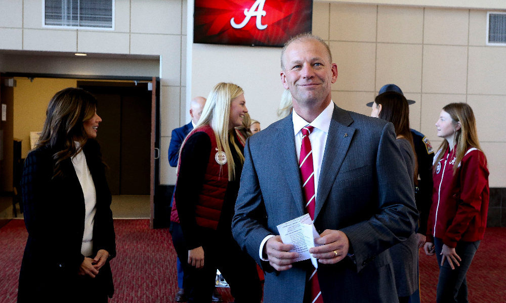Kalen DeBoer waits to be introduced as Alabama's new head coach