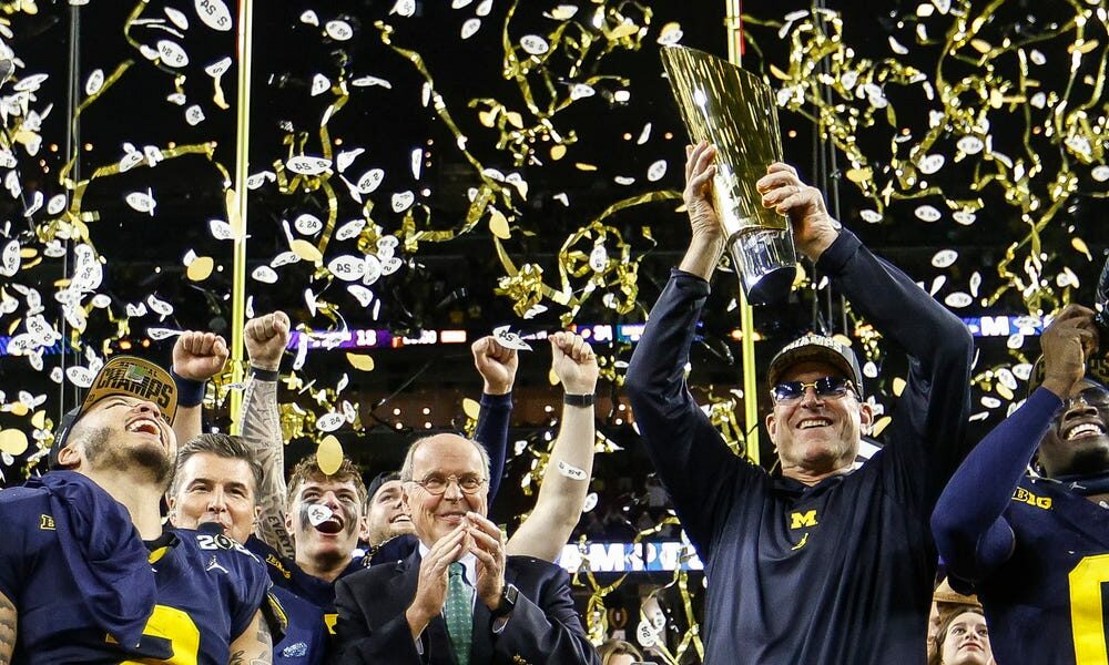 Michigan head coach Jim Harbaugh and the Wolverines celebrate winning the 2024 CFP National Championship Game.