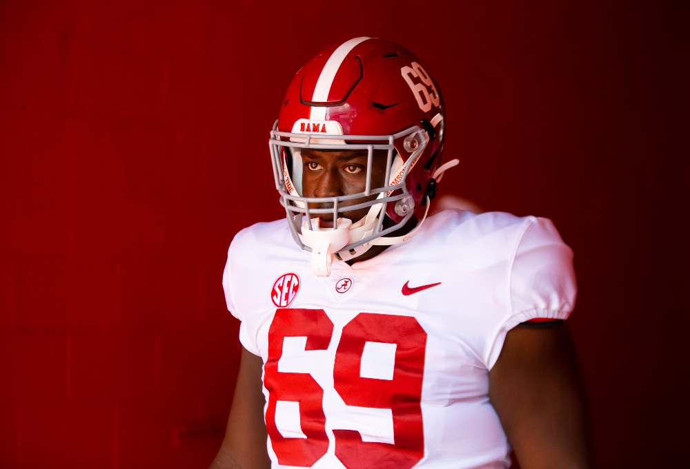 Alabama offensive lineman Terrence Ferguson walks out of the tunnel