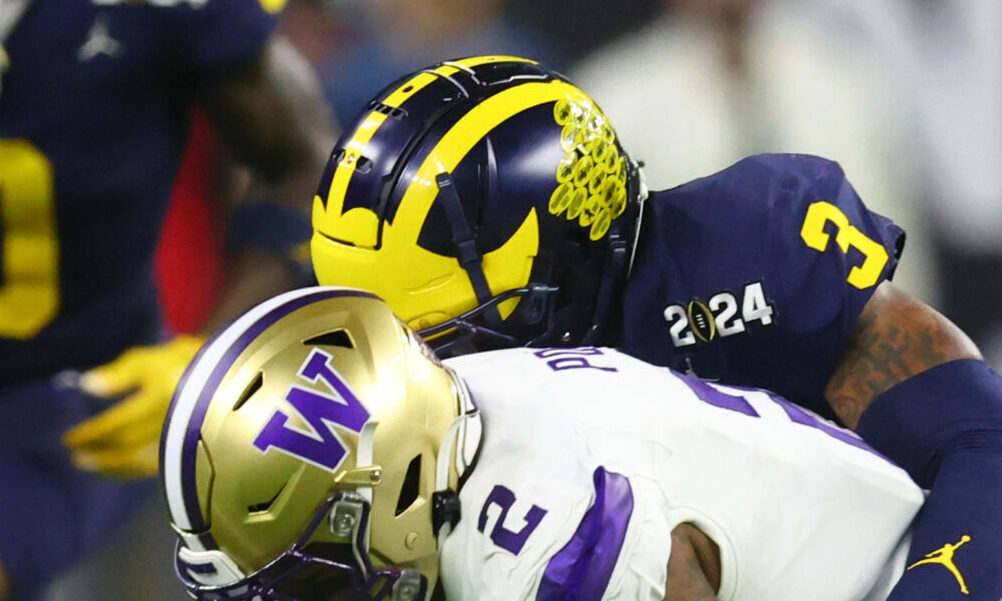 Michigan safety Keon Sabb (#3) forces a pass breakup on Washington's WR Ja'Lynn Polk in the 2024 CFP National Championship Game.