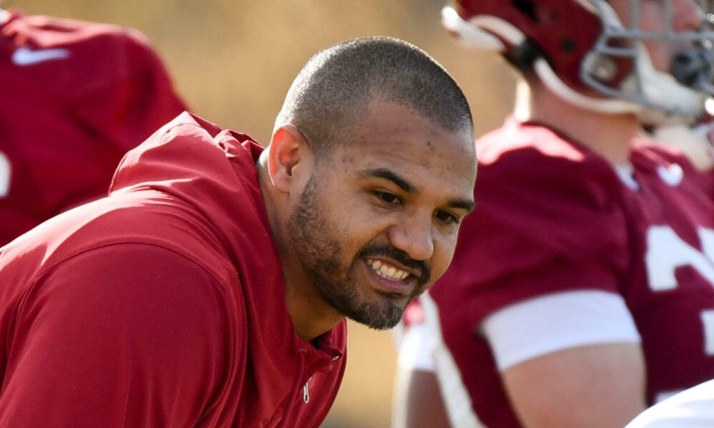 Alabama outside linebackers coach Christian Robinson watching the defensive secondary in spring practice.