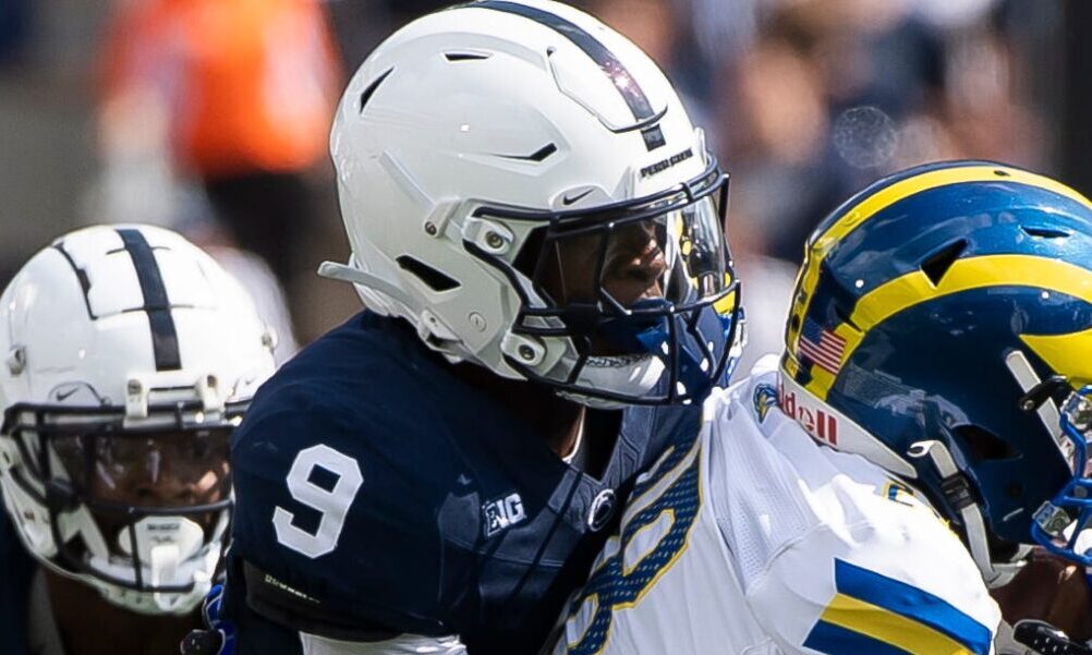 Penn State safety King Mack (#9) makes a tackle against a Delaware running back in 2023 matchup.