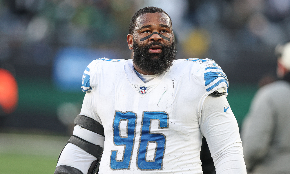 Former Alabama DL Isaiah Buggs warms up for the Detroit Lions