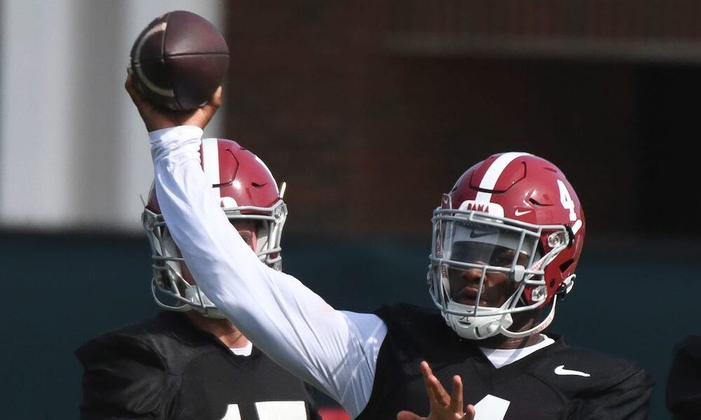 Alabama QB Jalen Milroe (#4) throws a pass during Crimson Tide's 2024 fall practice.