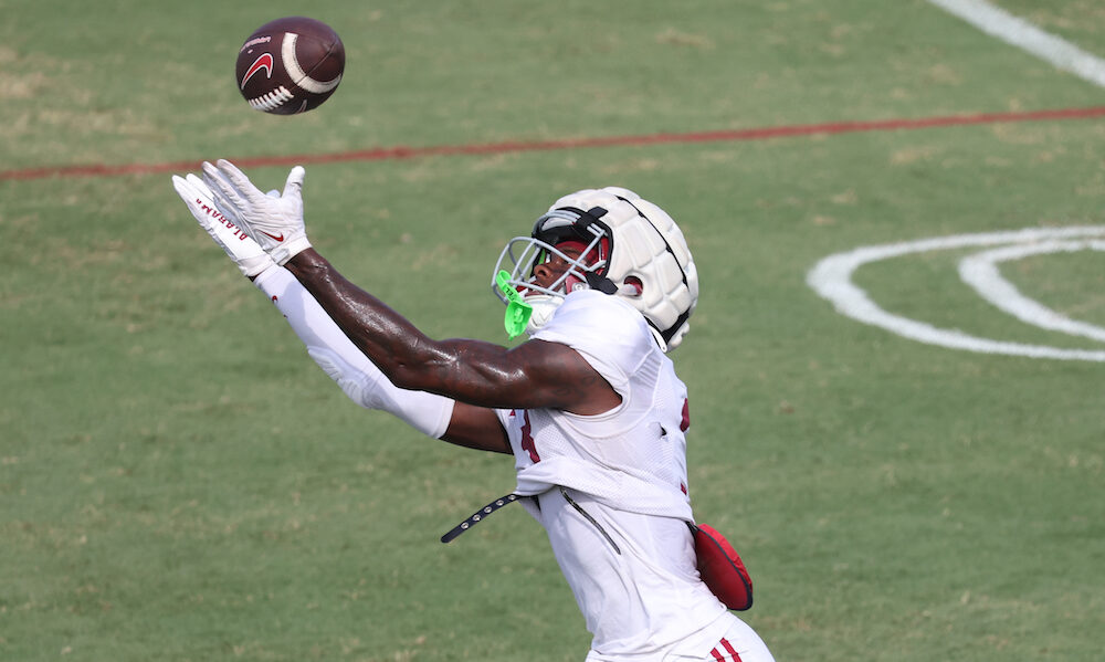 Alabama WR Emmanuel Henderson Jr. (#3) catches a pass during Crimson Tide 2024 fall camp practice.