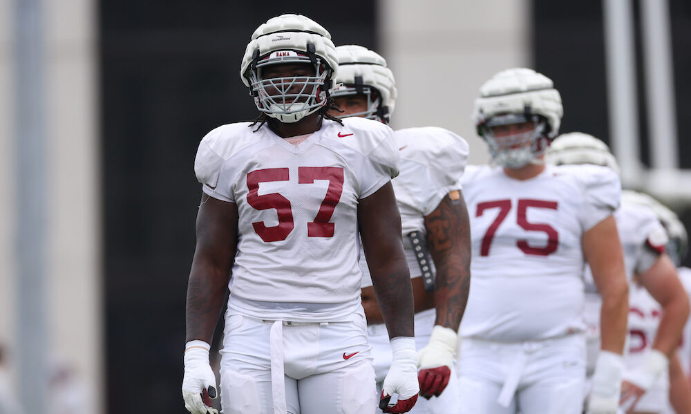 Alabama OL Elijah Pritchett (#57) running drills during Crimson Tide's 2024 fall camp practice.