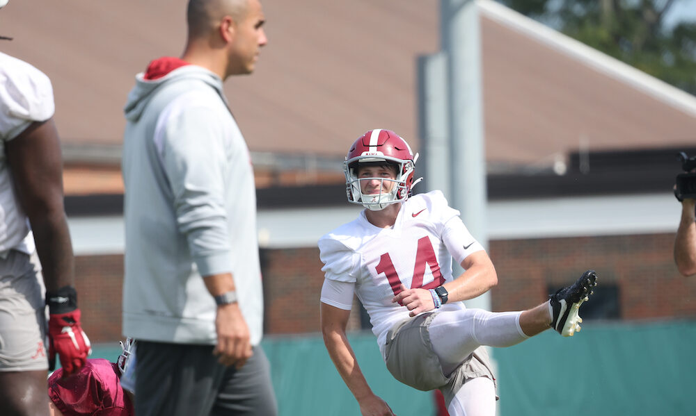 Alabama kicker Graham Nicholson (#14) kicks a field goal during 2024 Crimson Tide fall camp practice.