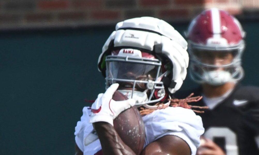 Alabama wide receiver Kendrick Law (#1) makes a catch in 2024 fall camp practice.