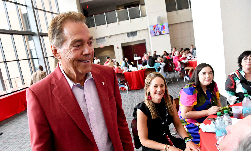 Nick Saban greets tables at the Nick's Kids Luncheon