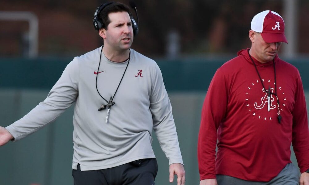 Alabama OC Nick Sheridan signaling gestures to the Crimson Tide during 2024 spring practice.