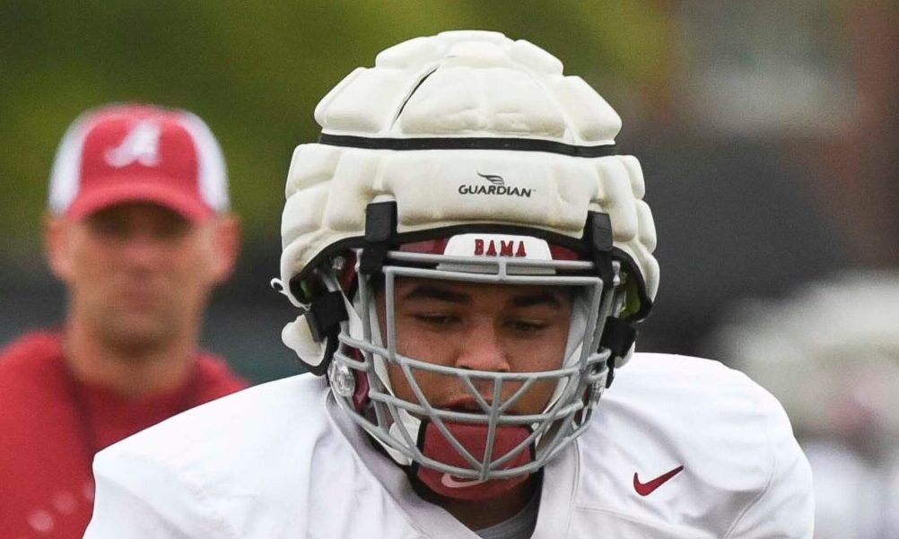 Alabama OL Parker Brailsford (#72) hitting the sled for position group drills in fall camp practice.