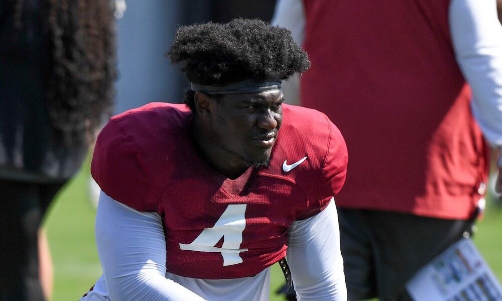 Alabama LB Qua Russaw (#4) takes a knee after growing through a rep in 2024 fall camp practice.