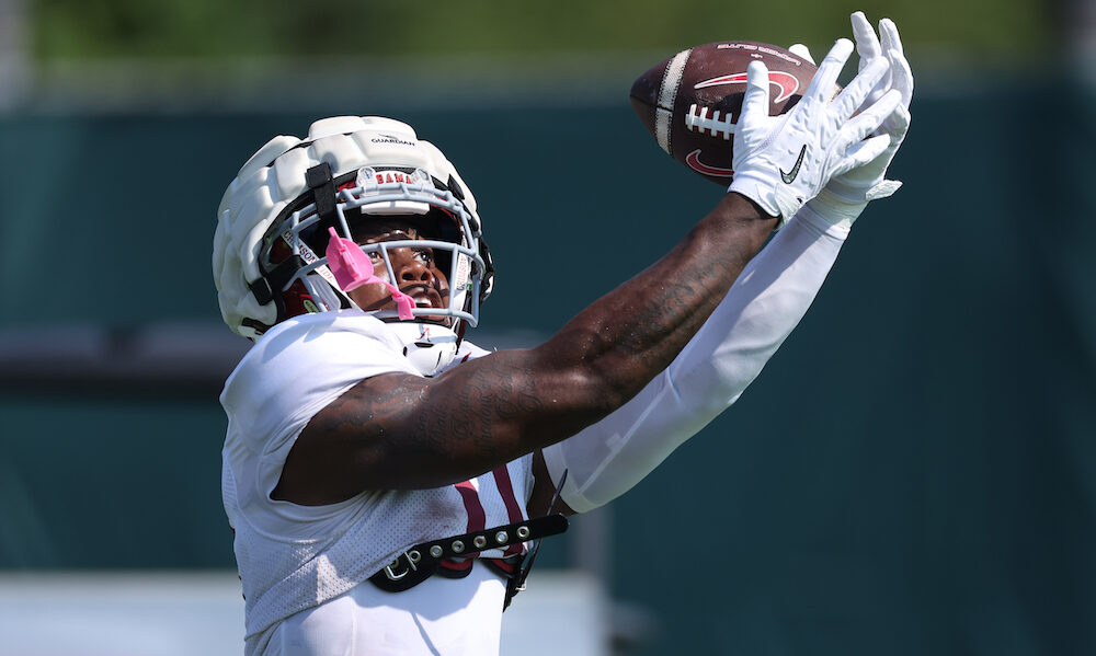 Alabama freshman WR Rico Scott (#11) catches a pass during Crimson Tide 2024 fall camp practice.