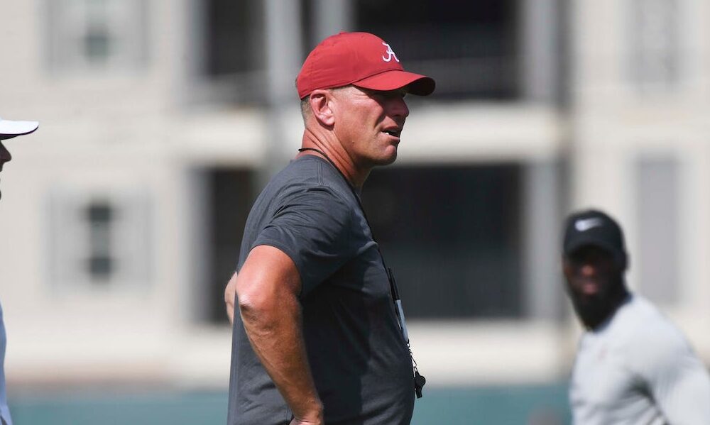 Alabama head coach Kalen DeBoer on the practice field during 2024 Crimson Tide fall camp practice.