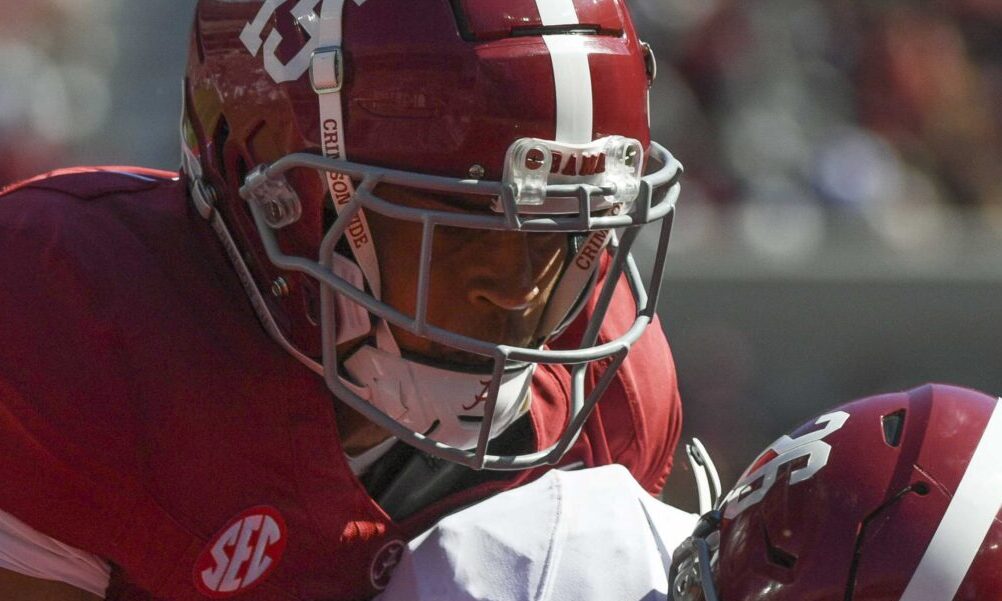 Alabama freshman DB Zabien Brown (No. 15) hits RB Jam Miller during the Crimson Tide's 2024 spring game.