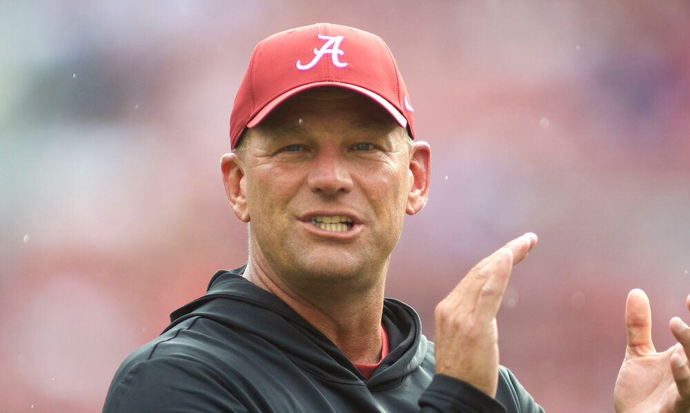 Alabama head coach Kalen DeBoer clapping during the Crimson Tide's season opener against Western Kentucky.