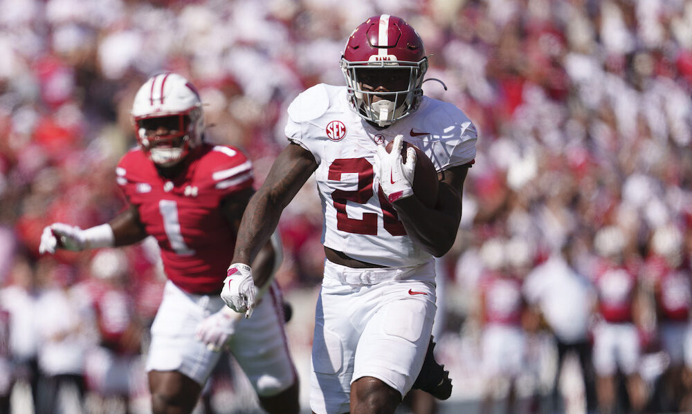 Alabama RB Jam Miller (#26) runs for a 34-yard touchdown against Wisconsin in 2024 matchup at Camp Randall Stadium.