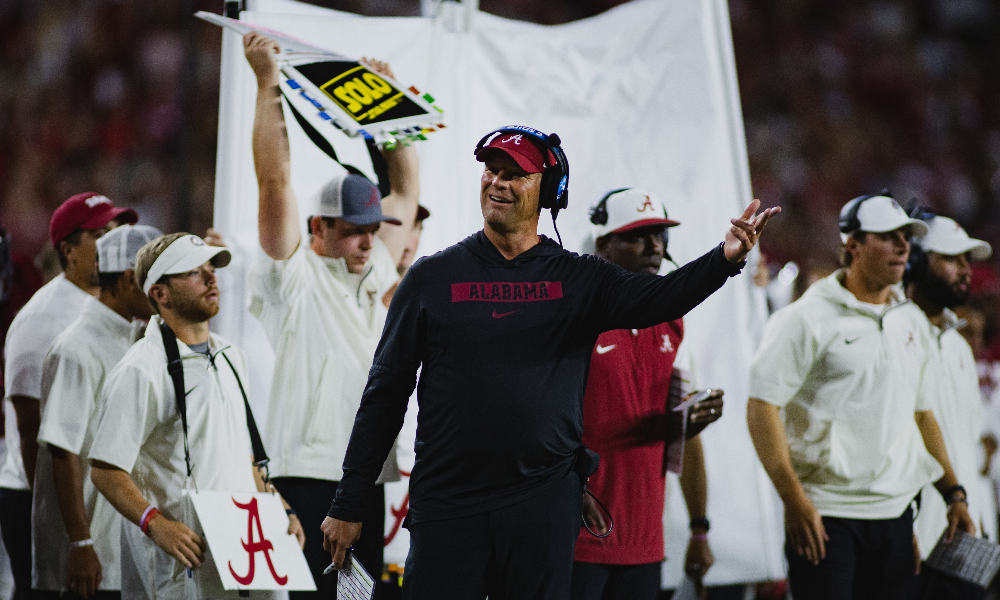 Alabama head coach Kalen DeBoer gestures on the field after a call