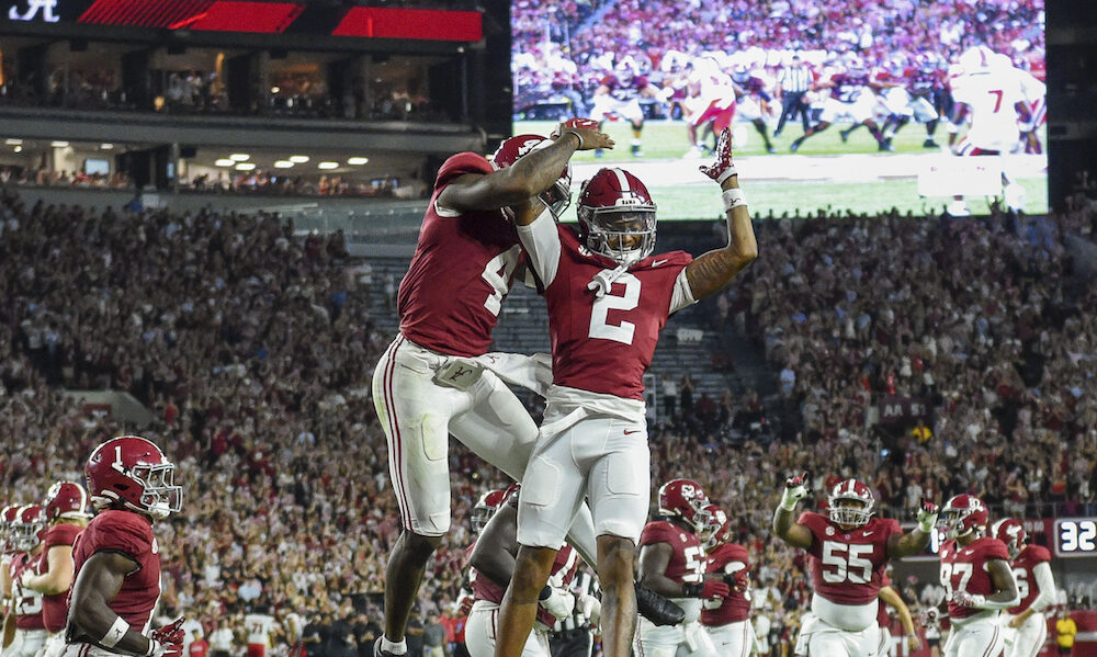 Alabama WR Ryan Williams (#2) celebrates a touchdown with QB Jalen Milroe (#4) in Crimson Tide's 2024 season opener vs. WKU.