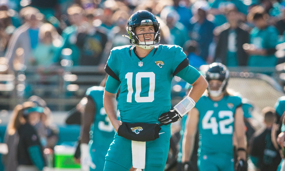 Jacksonville Jaguars quarterback Mac Jones (10) looks on during the second quarter against the Houston Texans at EverBank Stadium.