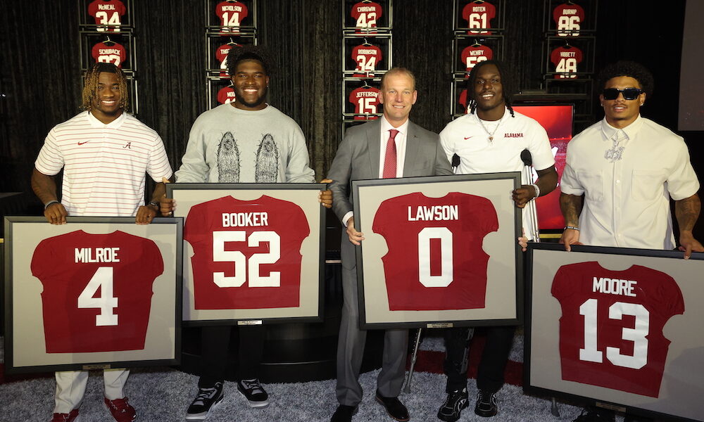 Alabama football 2024 team captains and Kalen DeBoer in the Crimson Tide's annual awards banquet.