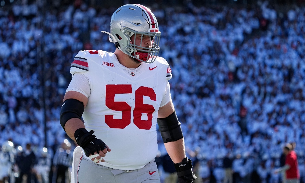 Ohio State offensive lineman Seth McLaughlin walks onto the field